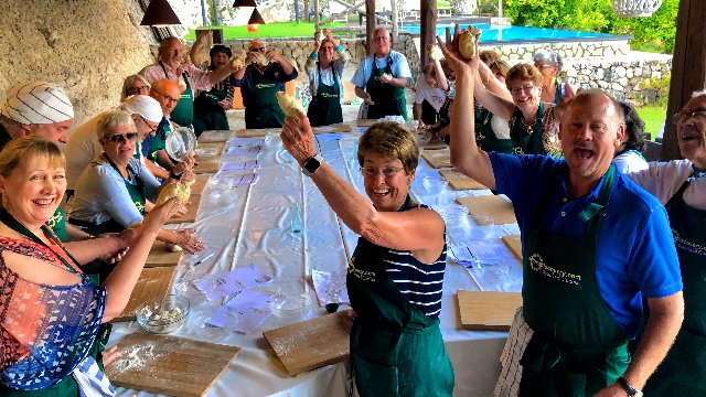 Having some fun during our cooking class on the Amalfi Coast, Italy. Our guests drink, relax, and have fun cooking!